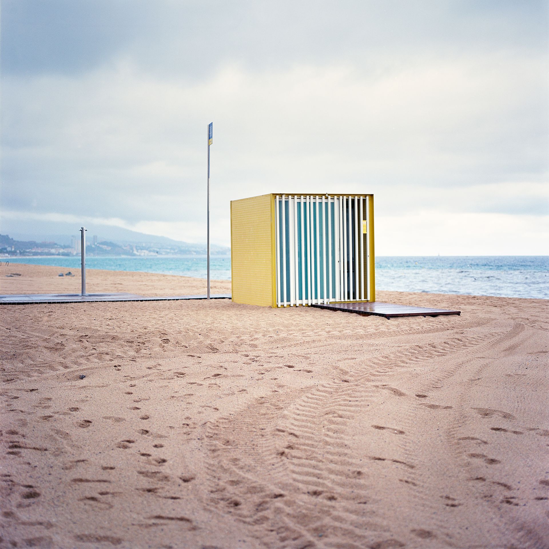 A yellow box on the beach